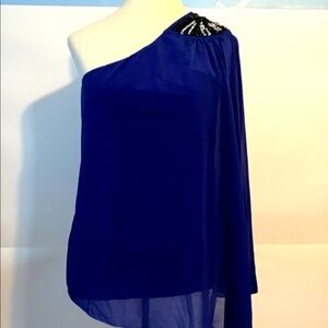 Ricki’s one shoulder, bat-wing sleeve beaded top